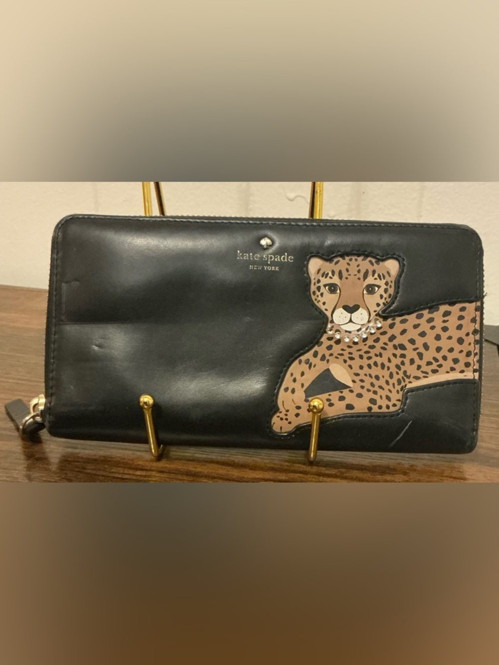 A rare vintage 2017 Kate Spade New York Run Wild Leopard Appliqué Leather wallet